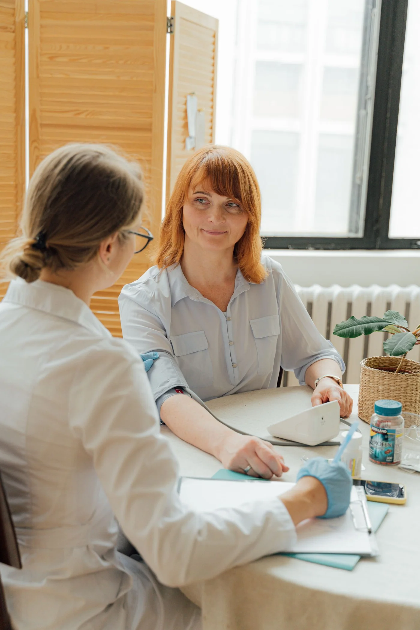 Doctor and adult patient in a consultation